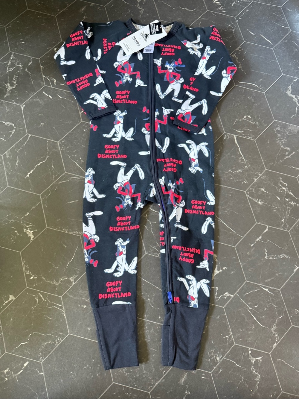 Bonds Goofy Print Zip One-Piece Bodysuit with Red Accents